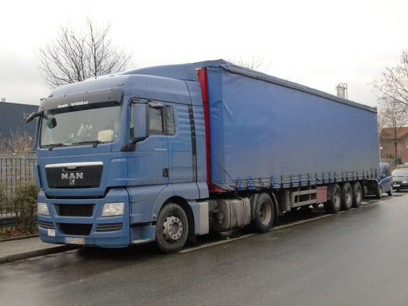POR-MAN-TGX-18480-blau-DS-070110-01.jpg - Trucker Jack