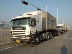 Scania-!24-G-420-weiss-Jeong-310105-01