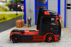 20260221-IMB-eActros-schwarz-rot-01022